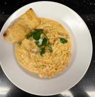 76. FETTUCCINE AL SALMONE