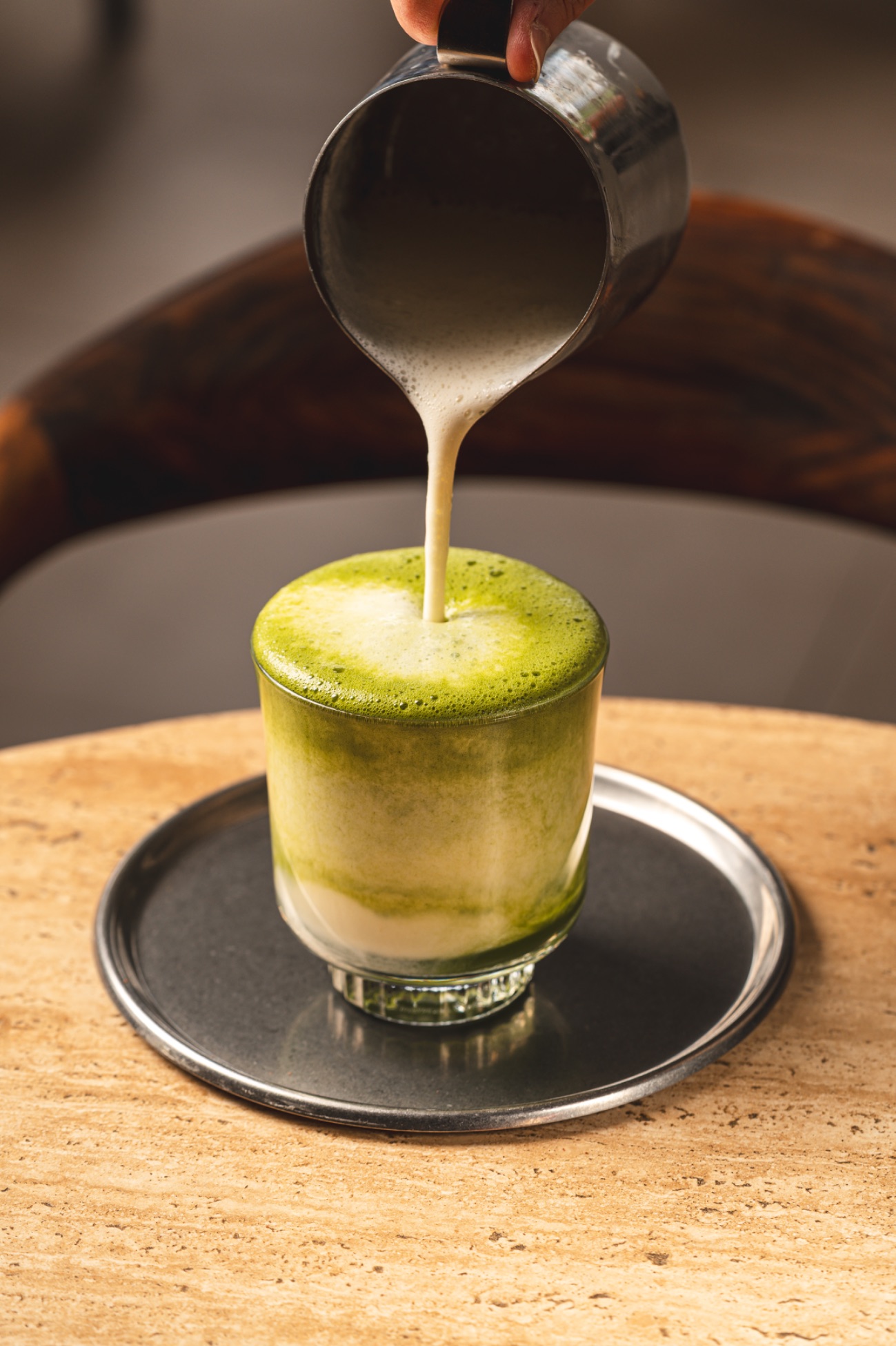 Banana Matcha - Ev yapımı muz püresi, vanilya, süt, matcha çayı ile hazırlanır. Soğuk servis edilir.
