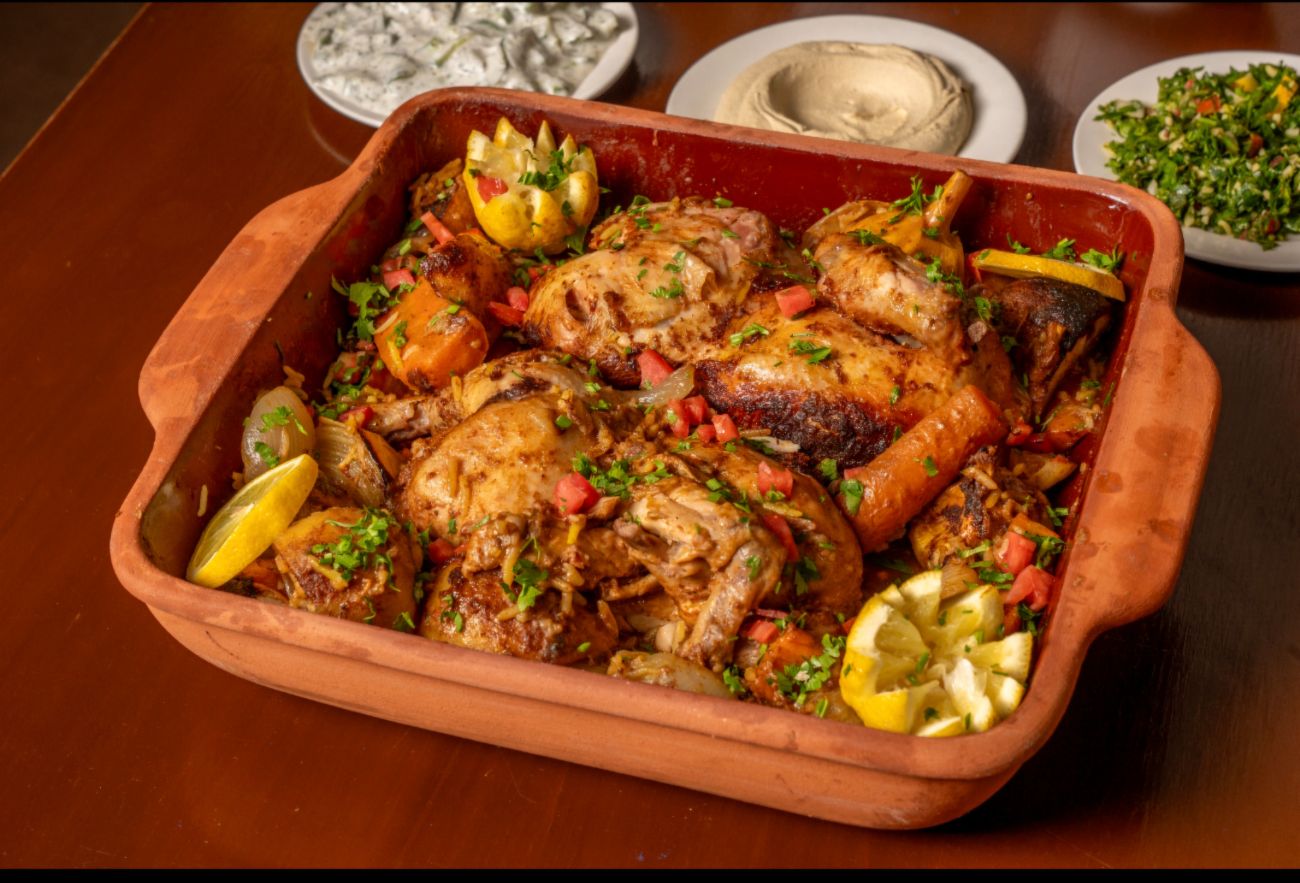 نصف دجاج بالفخار مع التمن