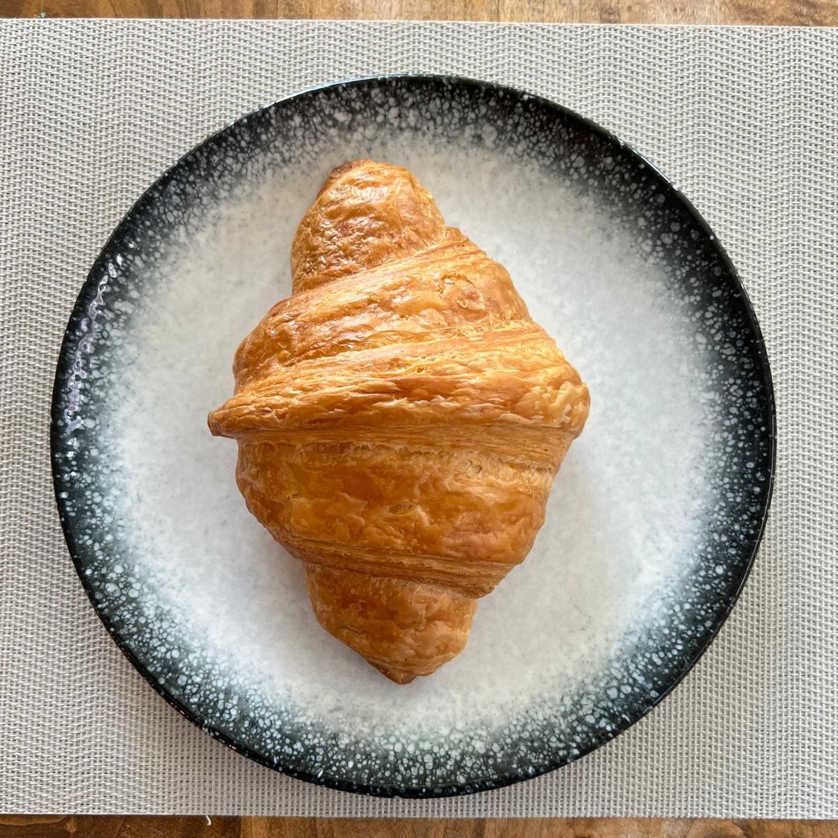 Plain Croissant with Butter (120 gr) - Served with cheese sauce and jam.