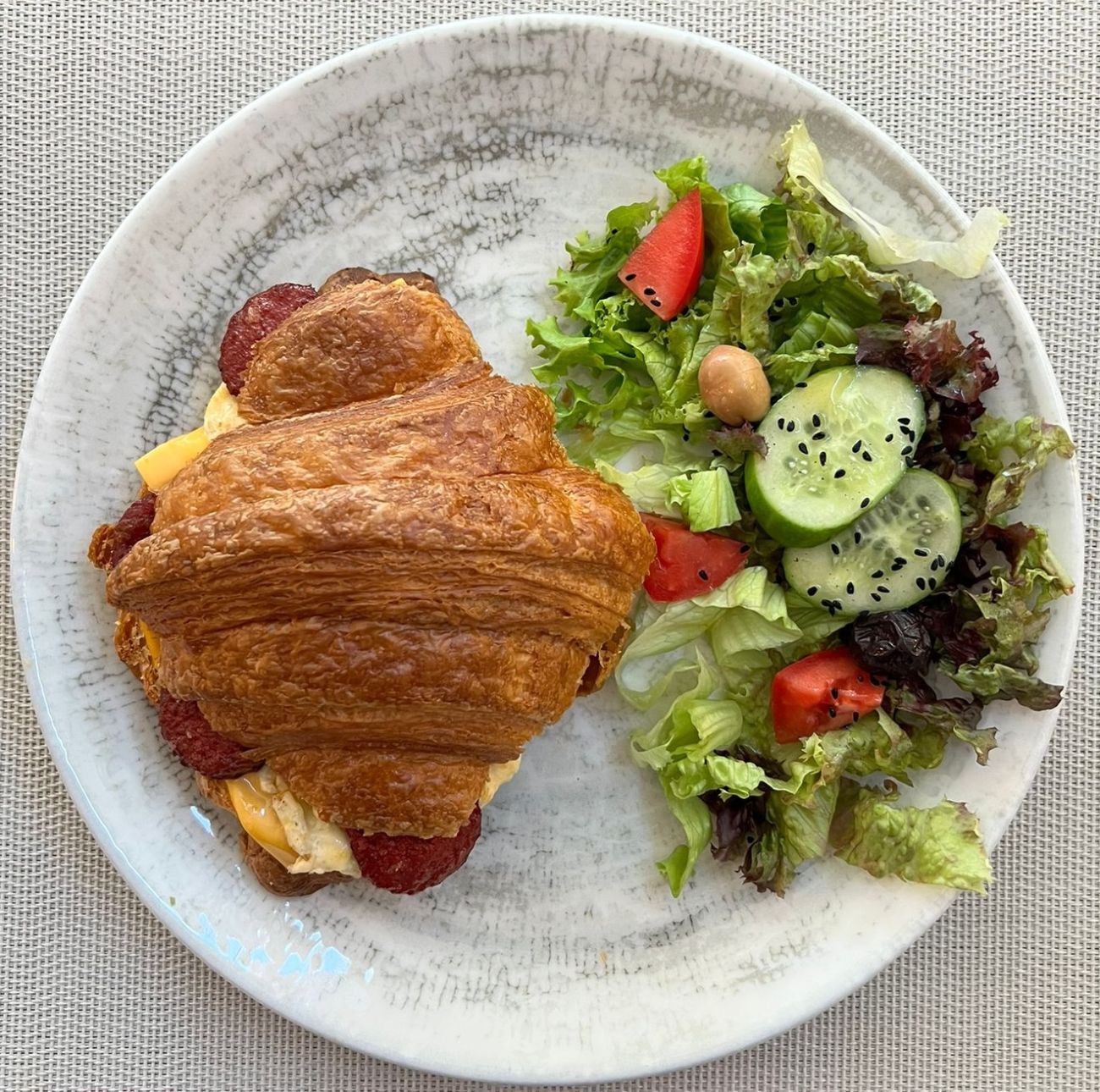 Sausage Sandwich Croissant - Sausage, Creamy Cheese, Egg; Served with Salad