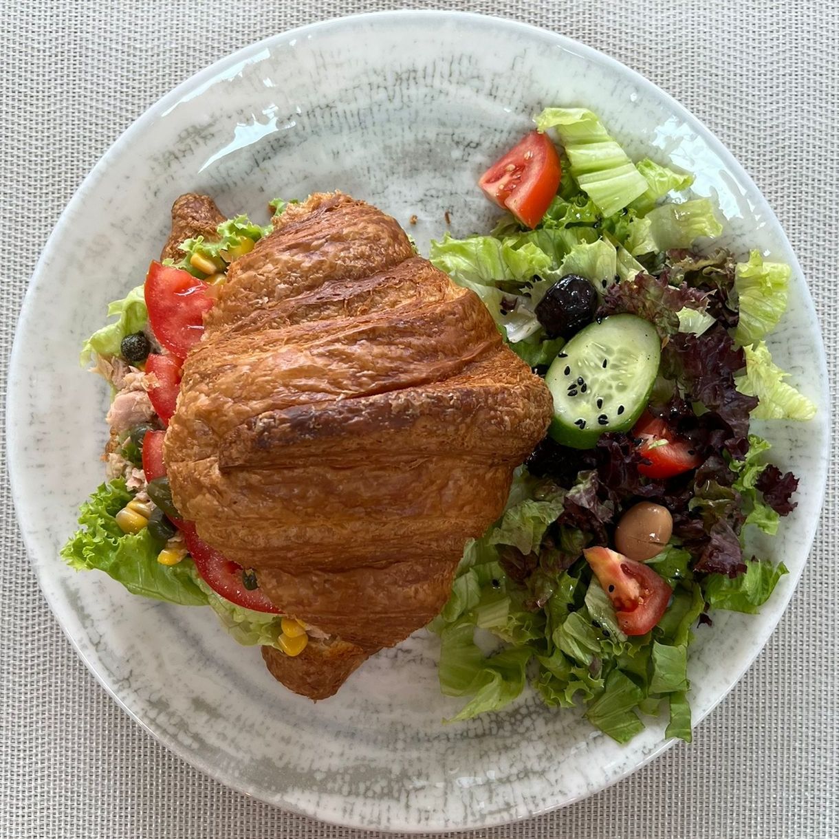 Tuna Sandwich Croissant - Tuna, Tomatoes, Corn, Mayonnaise, Lettuce, Capers; Served with Salad