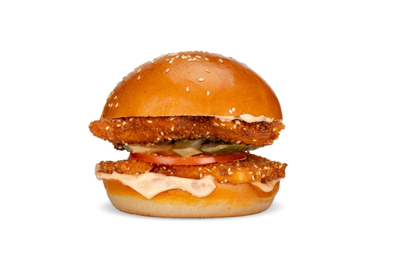 DOUBLE ŞİNİTZEL BURGER - 200 gr. tavuk şinitzel,  domates, turşu seçeceğiniz yeşillik veya patates kızartması ile