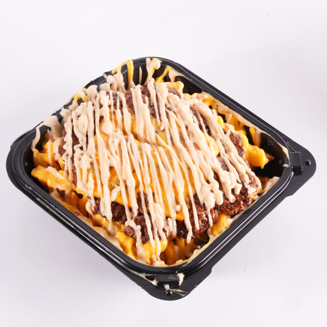 ديناميت فرايز - بطاطا مقلية . جبن شيدر .  شريحة سماش لحم بقري . بصل مكرمل . صلصة هاوس