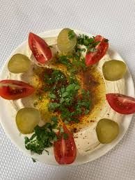 ANTAKYA USULÜ HUMMUS - Haşlanmış nohut, tahin, kimyon, domates, turşu ve organik Antakya zeytin yağı ile servis edilir