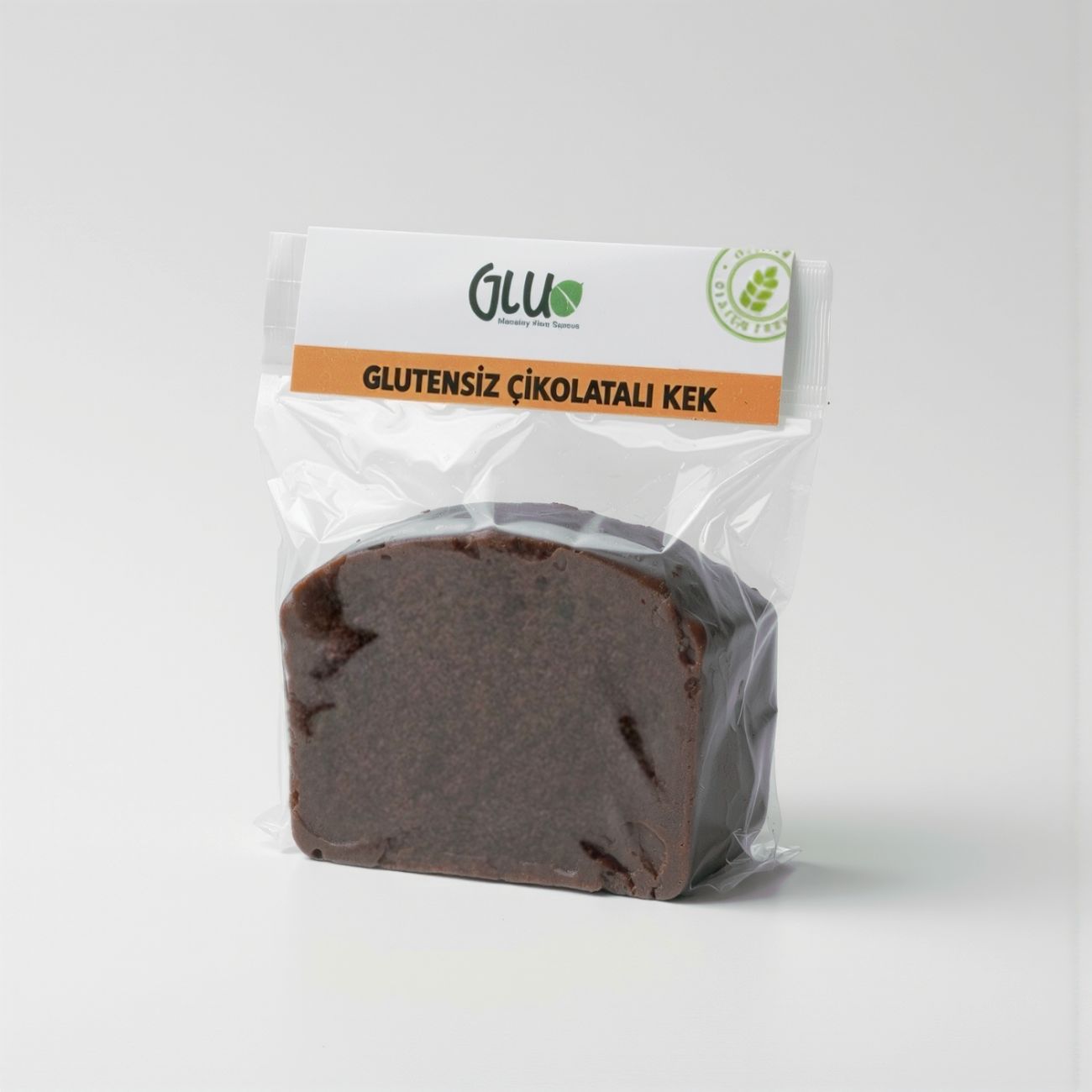 Glutensiz Çikolatalı Kek - Glutensiz Un, Pul Bitter Çikolata, Kakao, Tereyağ, Kabartma Tozu, Sıvı Krema, Tuz, Toz Şeker, Yumurta.