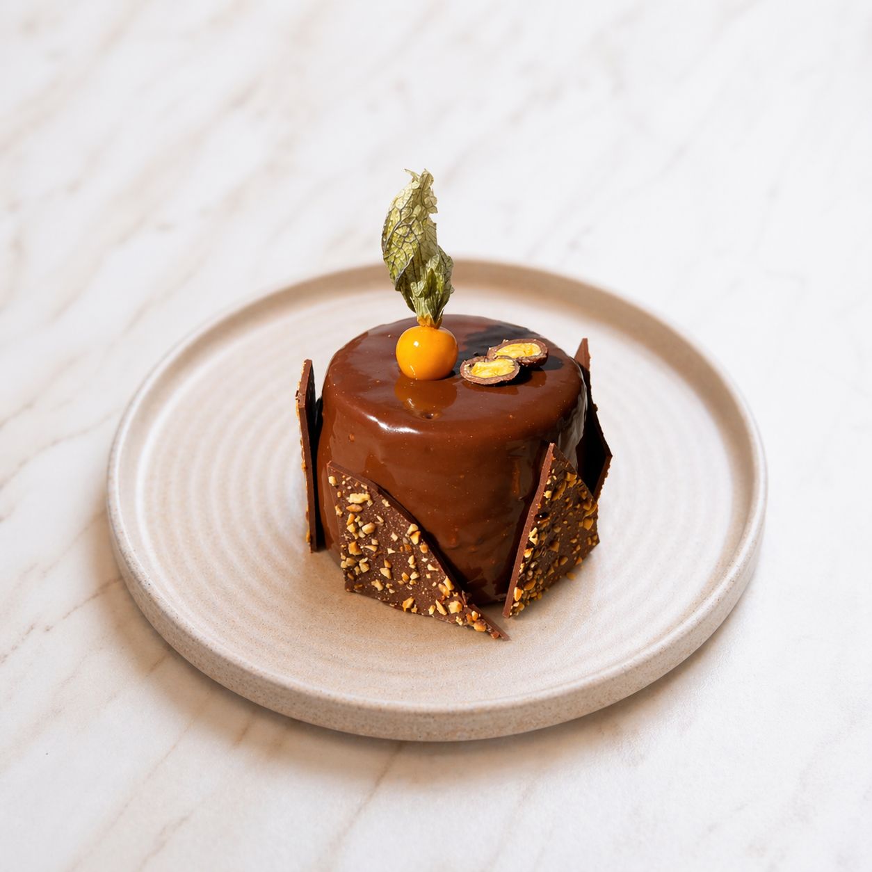 Caramel Dore - Truff Ganaj, Karamel Sos, Sponge Kek, Profiterol Kreması.