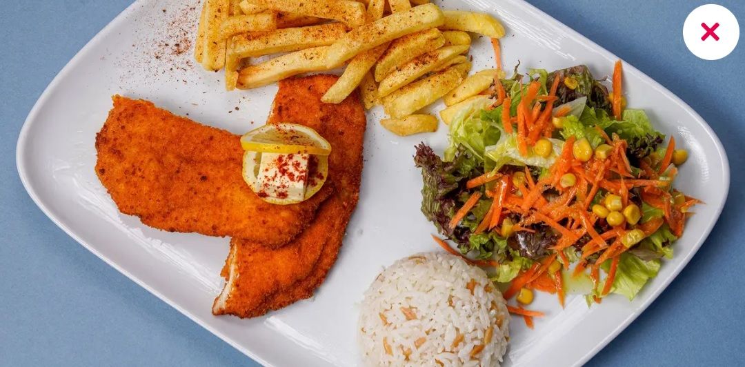 Klasik Schnitzel - (180 gr. Tavuk bonfile) garnitürleri ( pilav, patates, salata)