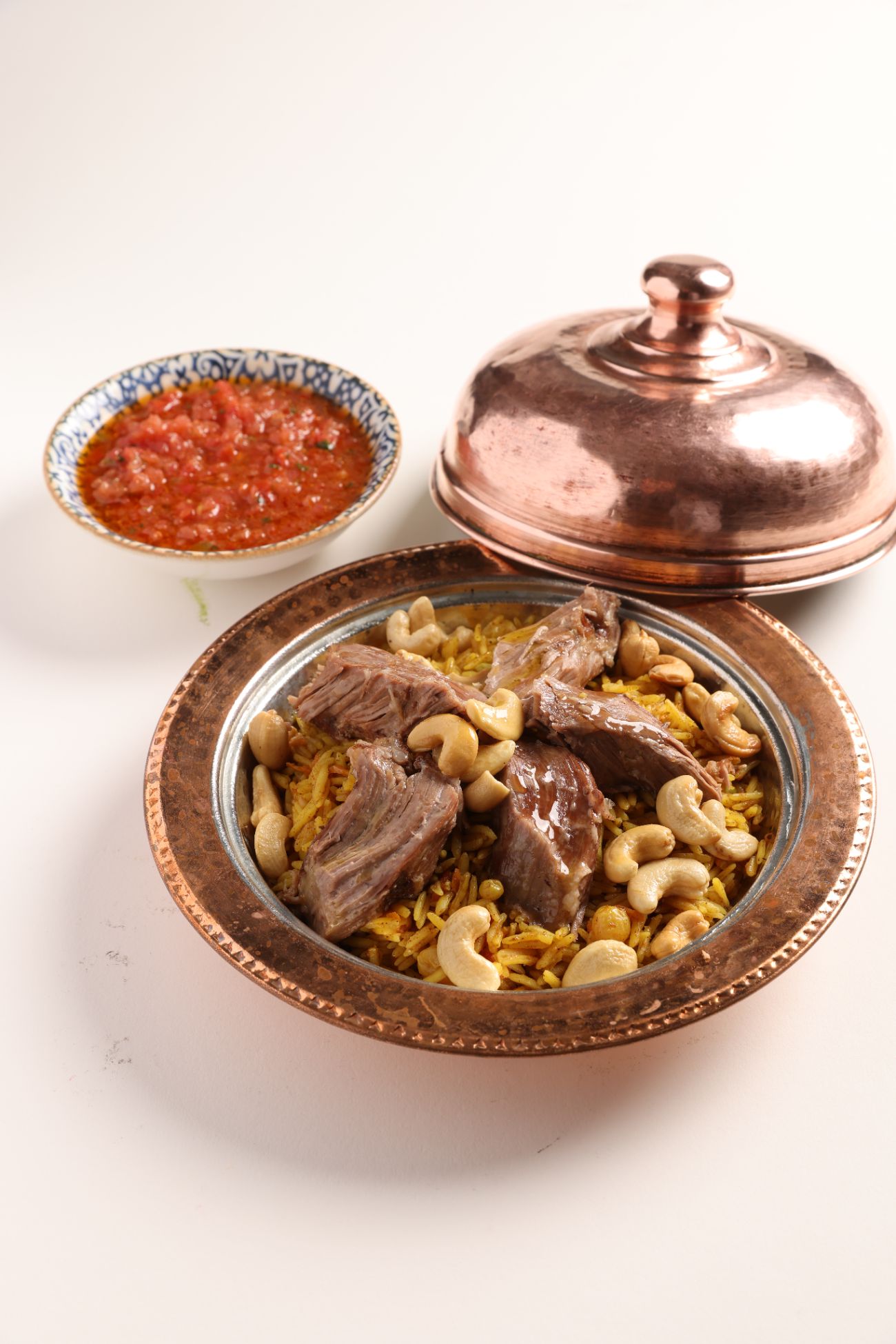 Et Kabsa - Güveçte fıstıklı ve rosto kuzu etli  (100 gr) Biryani pilav