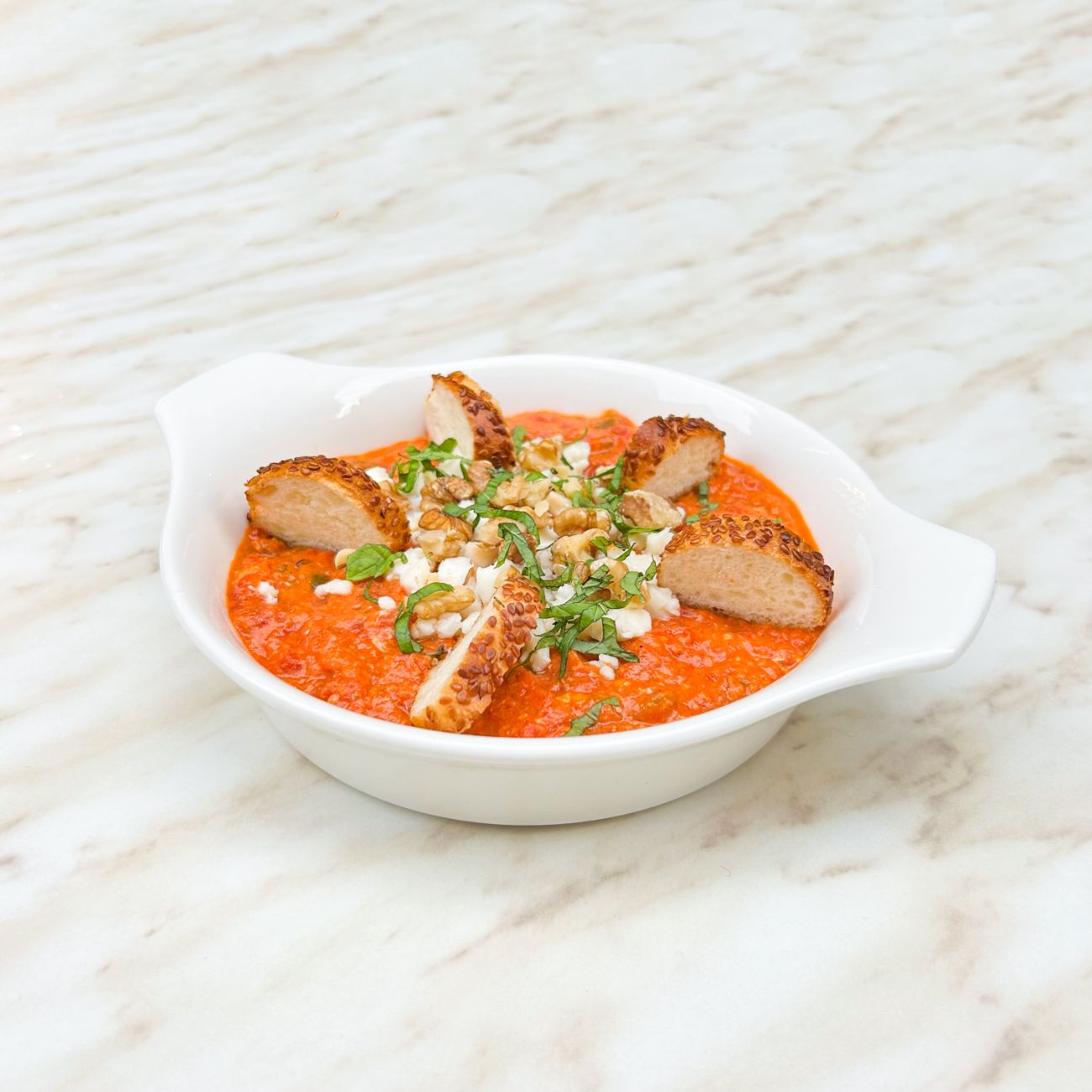 Ezine Peynirli Cevizli Menemen - Ezine Peyniri, Domates, Biber, Yumurta, Nane, Baget Ekmek.