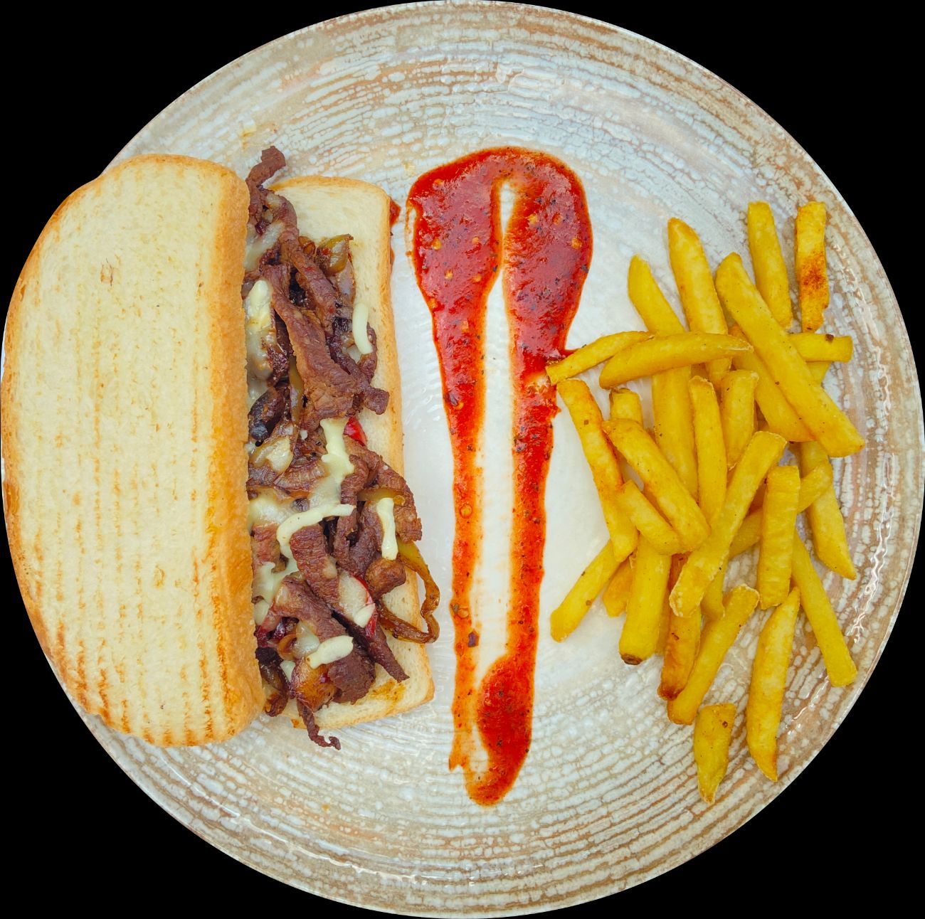 Cheese Steak Sandviç - Sandviç ekmeği,sotelenmiş et bonfile,al biber,mantar,soğan,eritilmiş kaşar ve cips ile servis edilir
