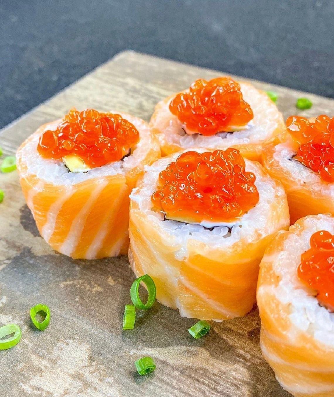 Philadelphia Delux-8pcs - Philadelphia Delux – A rich and indulgent roll with cream cheese, fresh salmon, surimi, avocado, and topped with salmon caviar, wrapped around seasoned rice