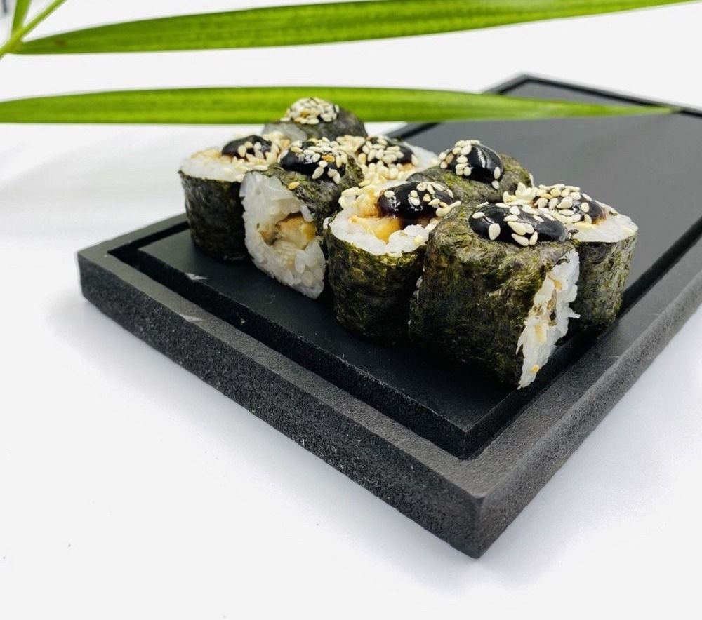 Maki Eel-8pcs - Maki Eel – A flavorful roll with tender eel and rice wrapped in nori, delivering a bold and satisfying umami taste