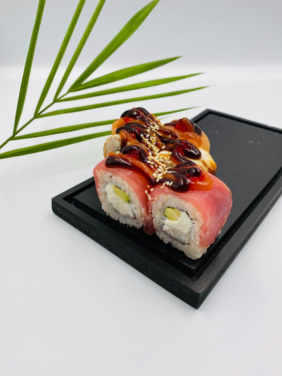 Bonsai Roll-8pcs - Bonsai Roll – A power-packed roll with salmon, eel, shrimp, avocado, caviar, cheese, and unagi sauce wrapped in spicy rice and nori