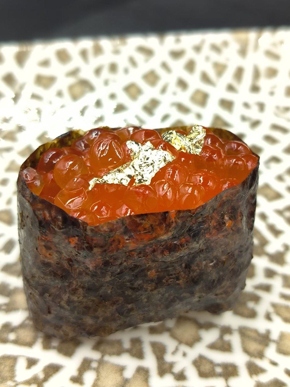 Ikura Gunkan - Ikura Gunkan – A luxurious gunkan-style sushi topped with rich and briny salmon roe, delivering an intense burst of ocean flavor in every bite