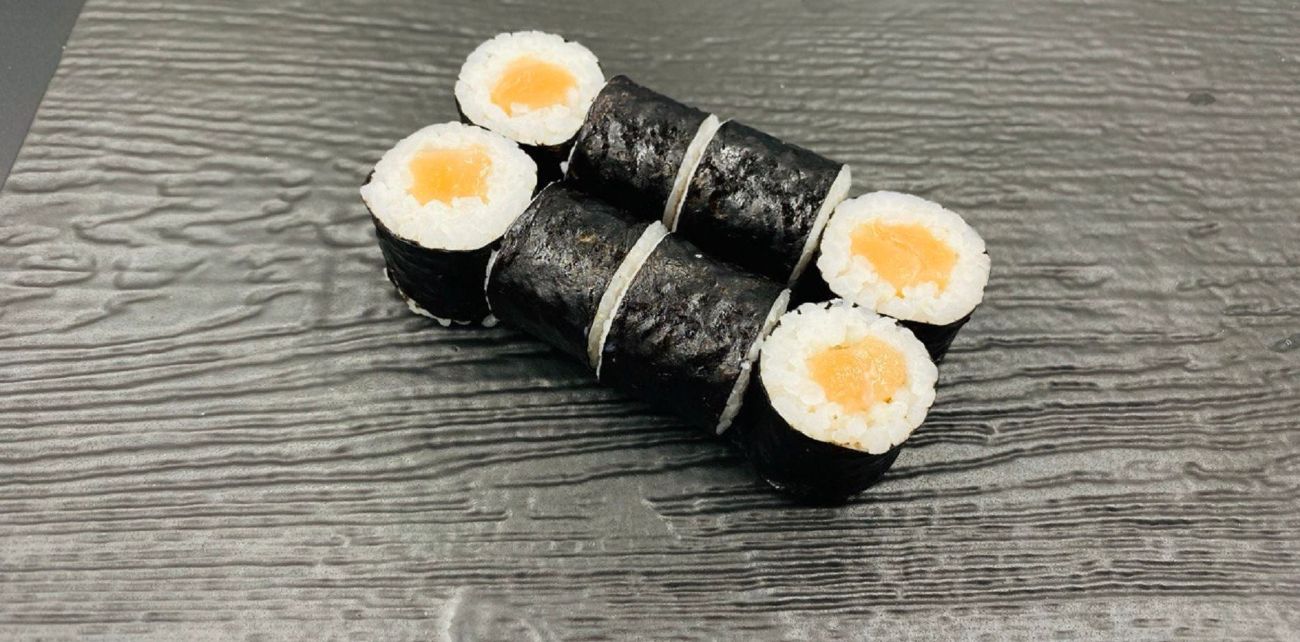 Maki Salmon-8pcs - Maki Salmon – A classic roll with salmon and rice wrapped in nori, offering a rich and savory flavor in every bite