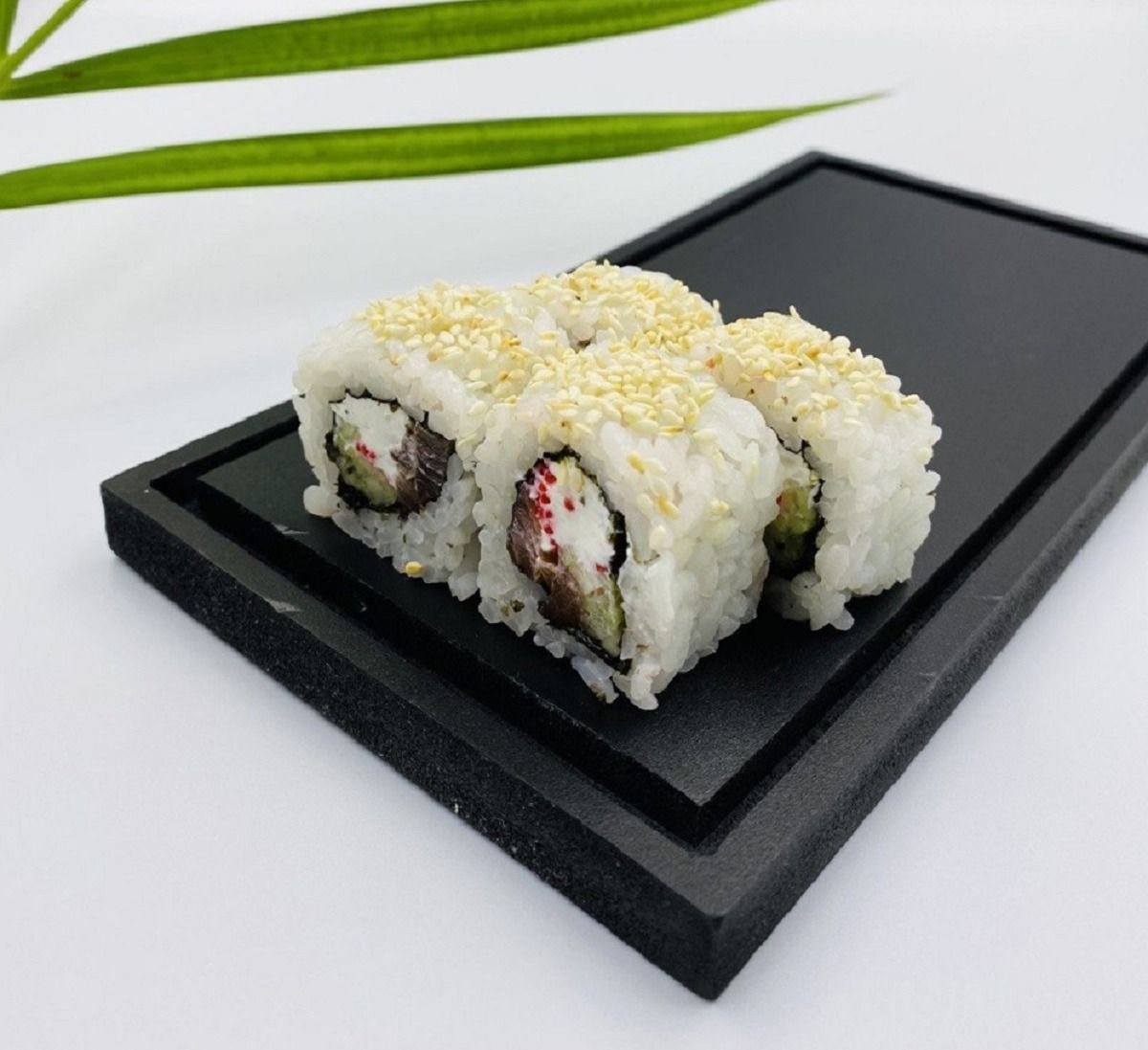 California Smoked Salmon-8pcs - California Smoked Salmon – A creamy and savory roll with smoked salmon, cream cheese, crunchy cucumber, sesame seeds, and nori wrapped around seasoned rice