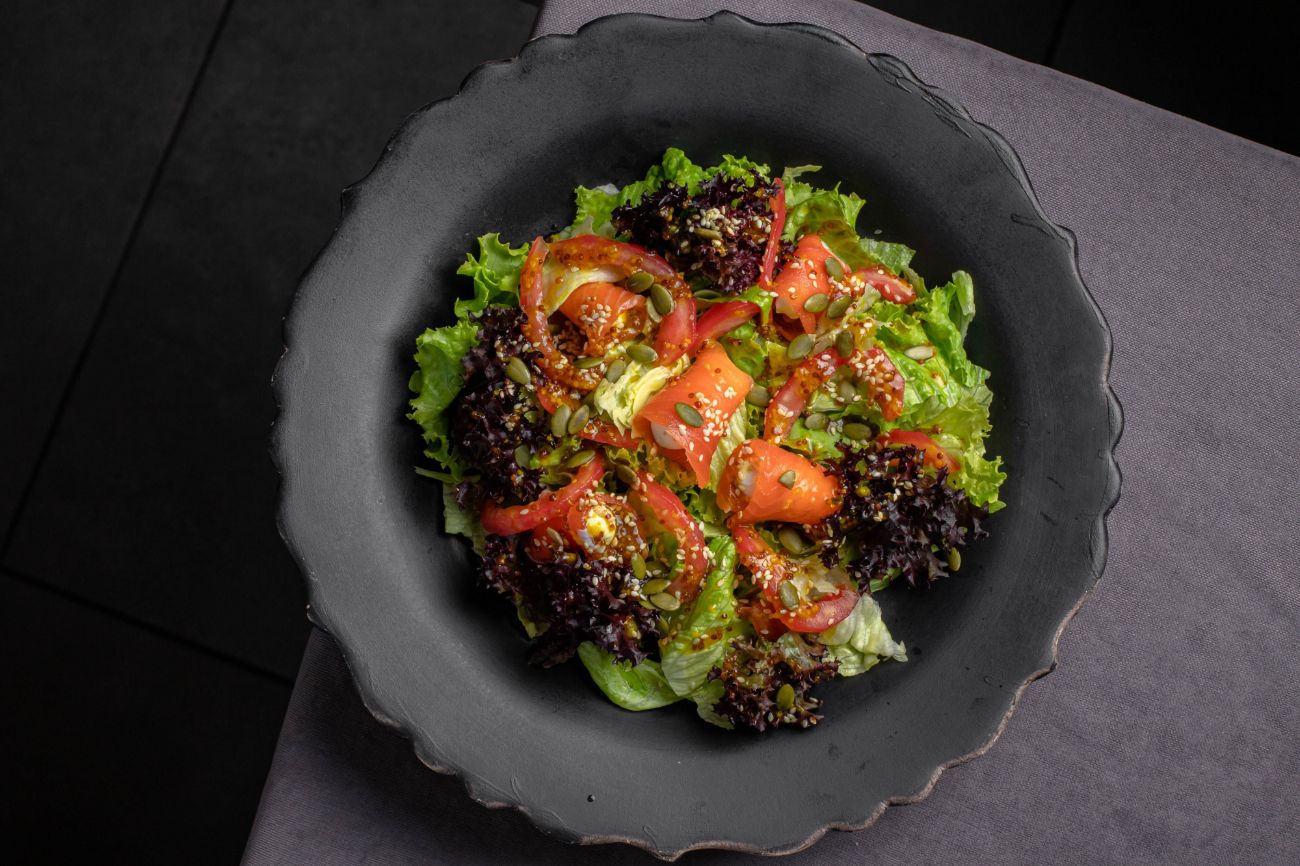 Philadelphia With Salmon - Salad - Philadelphia-style salad with smoked salmon, cream cheese, fresh tomato, lettuce, and special house sauce