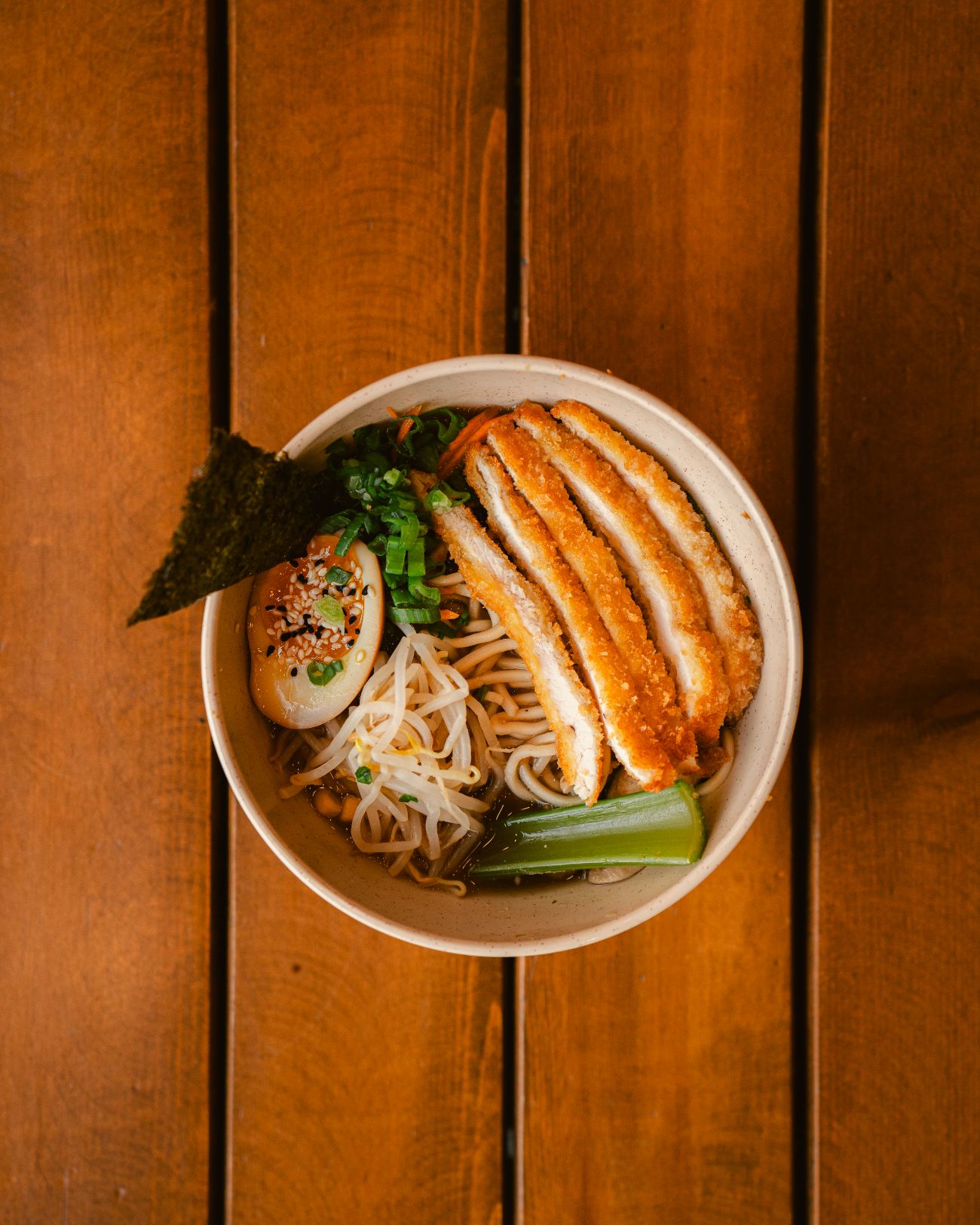Chicken Ramen - Katsu chicken, noodles, bean sprouts, egg, green onion, celery, carrot, corn, mushroom, nori and ramen soup