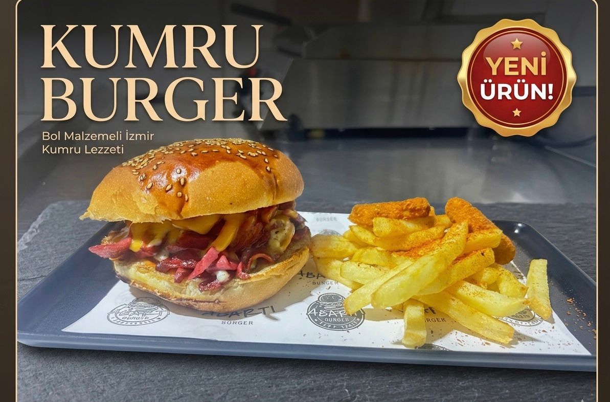 KUMRU BURGER - Sos, domates, turşu, sosis, chedar peyniri ve patates kızartması.