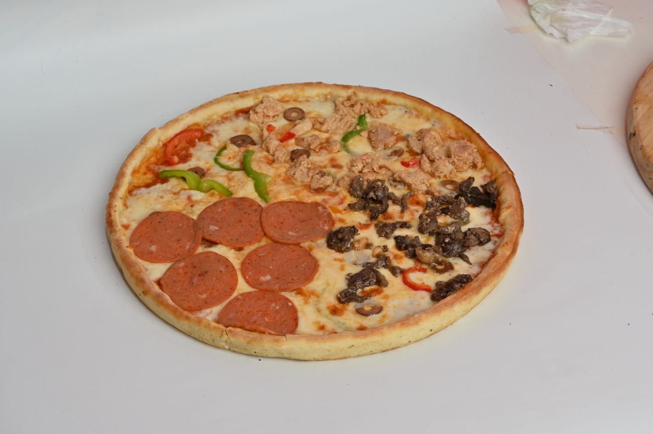 بيتزا الفصول الاربعة