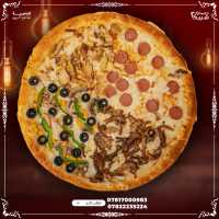 بيتزا الفصول الأربعة