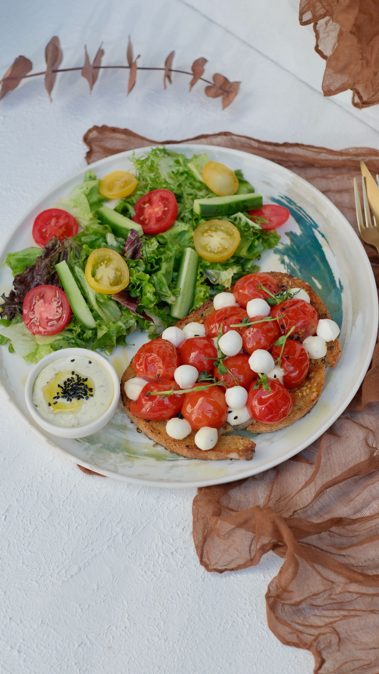 Mozzarella Confit Tartine - Sourdough bread toasted in butter, confit tomatoes, mozzarella, black cumin, sprouts, salad and pesto ricotta sauce...
