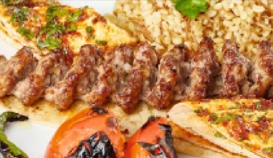 Urfa Kebap - Yanında Salata, Çiğ Köfte, Antep Ezme ve Haydari ile.
