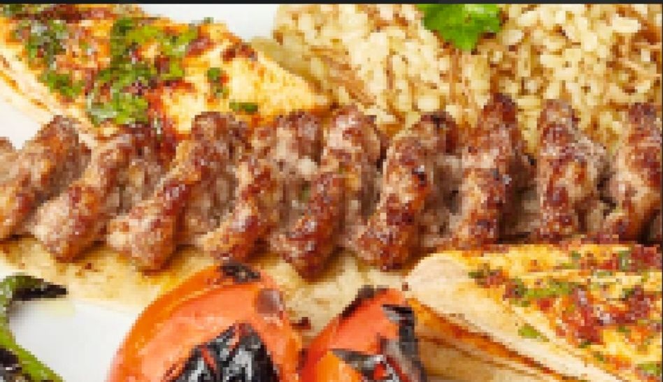 Adana Kebap - Yanında Salata, Çiğ Köfte, Antep Ezme ve Haydari ile.
