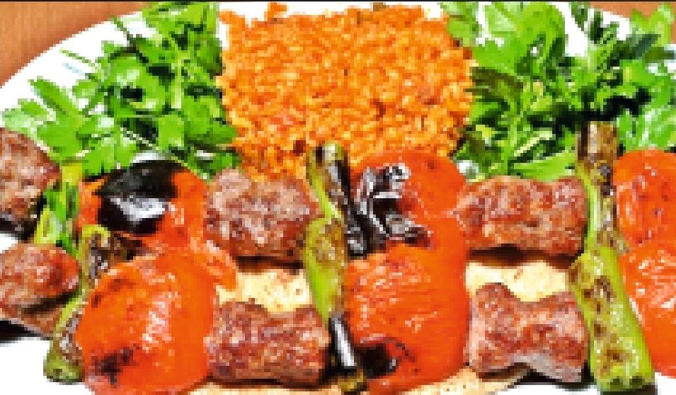 Domatesli Kebap - Yanında Salata, Çiğ Köfte, Antep Ezme ve Haydari ile.