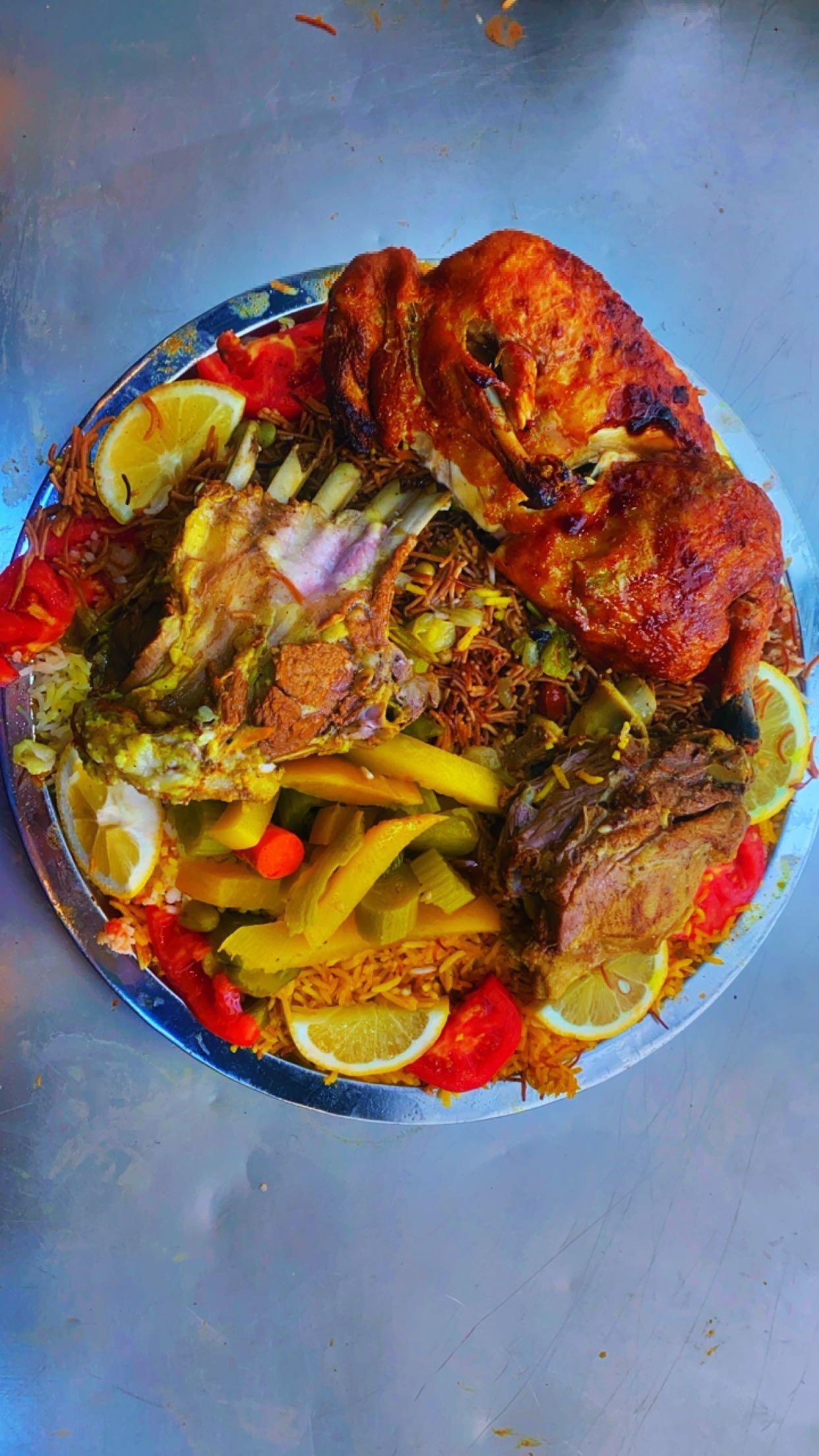 2نفر قوزي700غم مع نصف دجاجه دليميه