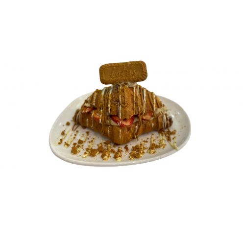 Lotus Kruvasan - Kruvasan arasında krema ve muz-çilek üzerine belçika çikolatası(beyaz), lotus kreması ve pudra şekeri ile servis edilir.